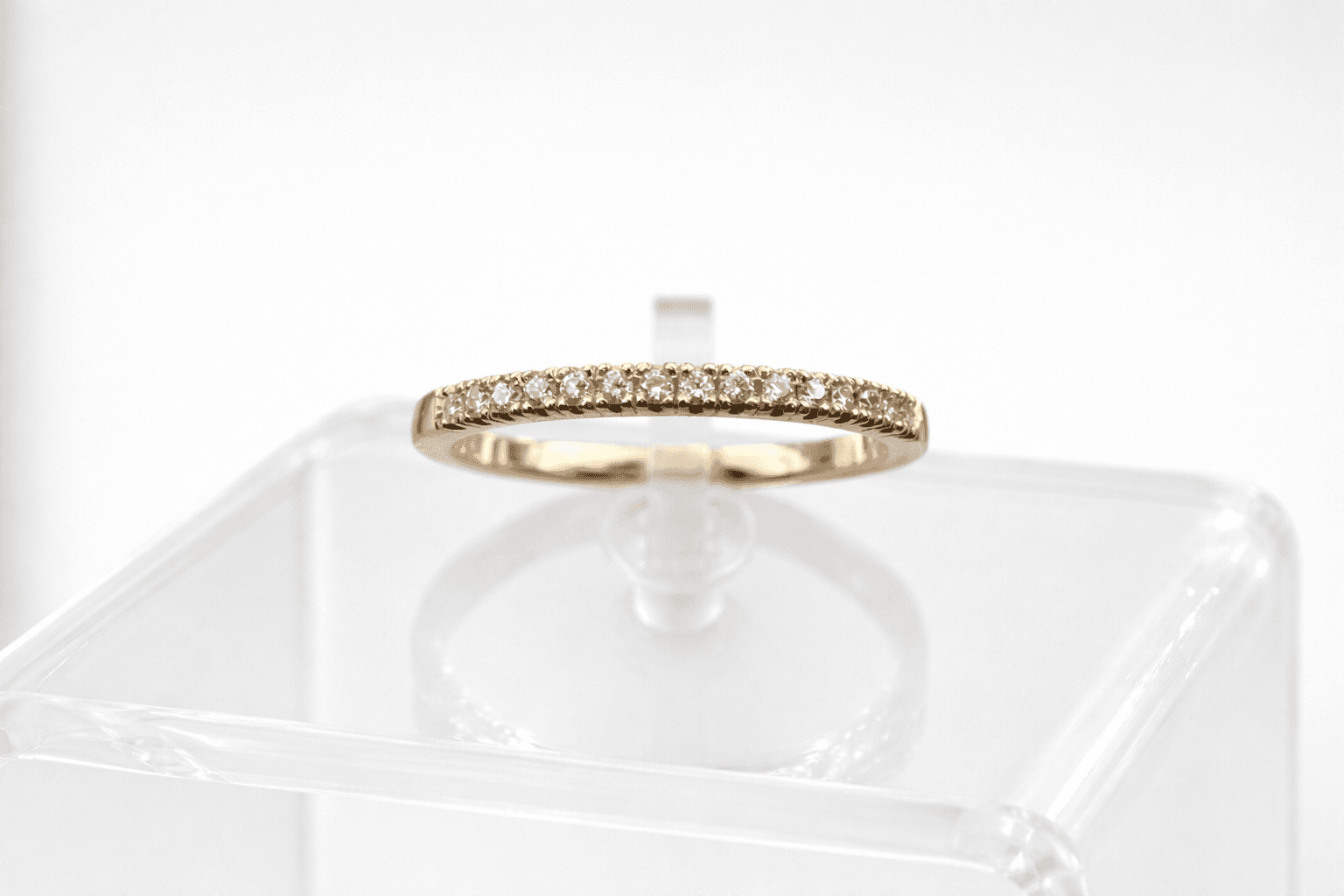 A 14k yellow gold pavé ring